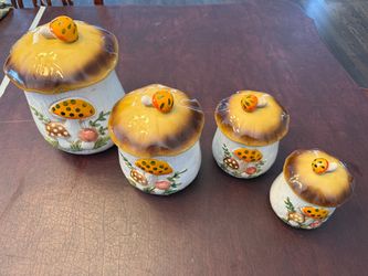 Vintage Merry Mushroom 4 piece canister set