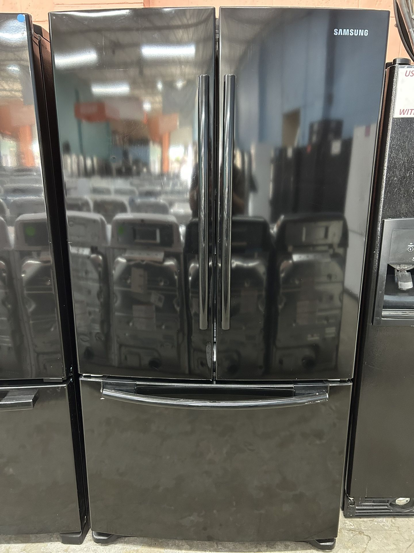 Black French Door Refrigerator With Ice Maker