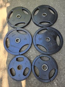 90c per lb slight damage 45lb and 25lb Rubber Olympic Weight Plates