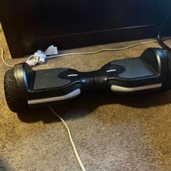 Black hoverboard with silver accents