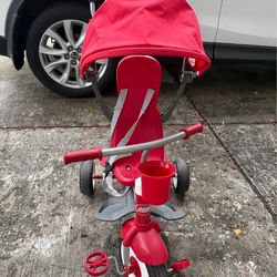 Radio flyer tricycle with push handle and canopy