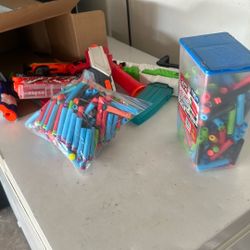 Eight Nerf Guns And Bullets Included