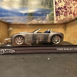 1:18 Scale Hotwheels Ford Shelby Cobra Diecast Car. New Unopened. $40.00 each.