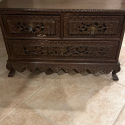 Antique carved Indonesian four drawer cabinet