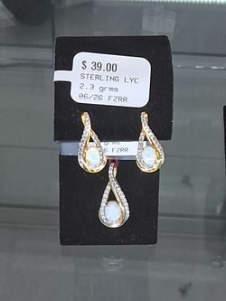$39 each sliver earrings/pendant with opal
