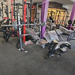 Olympic Bench Press With Barbell And Weights 