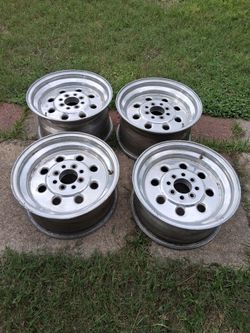 Four 15"  racing rims  84   mustang..4 lug
