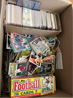 Over 1,000 baseball , basketball and football cards all in mint condition. 80’s, 90’s and some 00’s