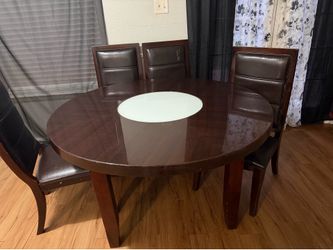 Dinner table needs small repairs rip on one chair