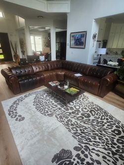Brown leather sectional recliner sofa
