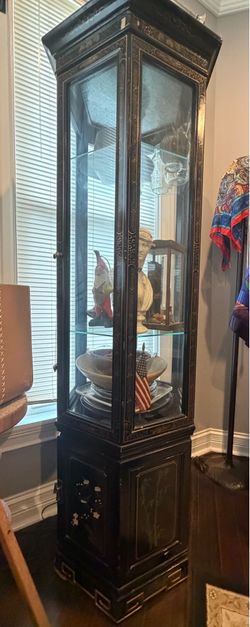 Hexagonal vintage curio cabinet.