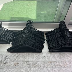 125 Black Plastic Hangers 