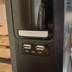 A mini-tower UPS Battery Back Up Surge Protector