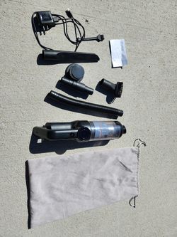 cordless vacuum cleaner
charger included
accessories included
cleaner length: 14"
works good
$10