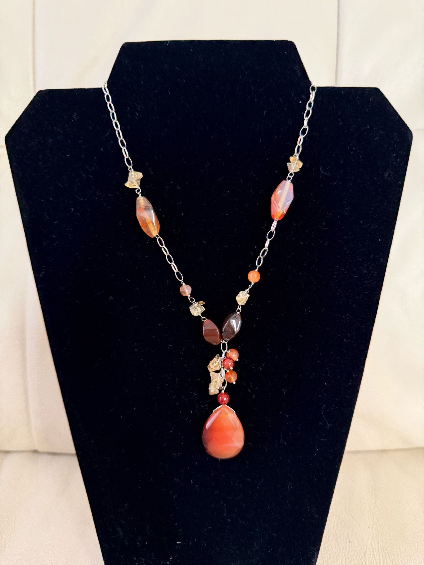 Stylish silver necklace with natural stones, made in Italy. Elegant and timeless accessory that adds a unique touch to any outfit. Beautiful craftsman