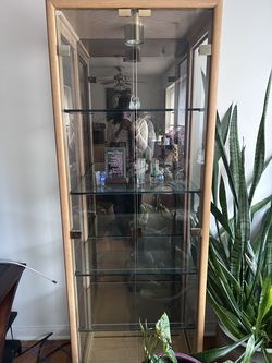 Set of 2 wood and glass curio cabinets