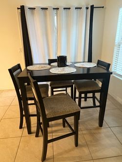 Black table and 4 chairs