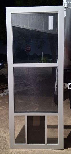 Stormdoor w/ Petdoor 1/2 Price (New)