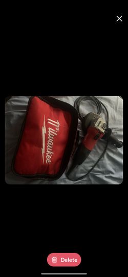 Milwaukee Corded Angle Grinder with Bagl and all attachments included originally gently used