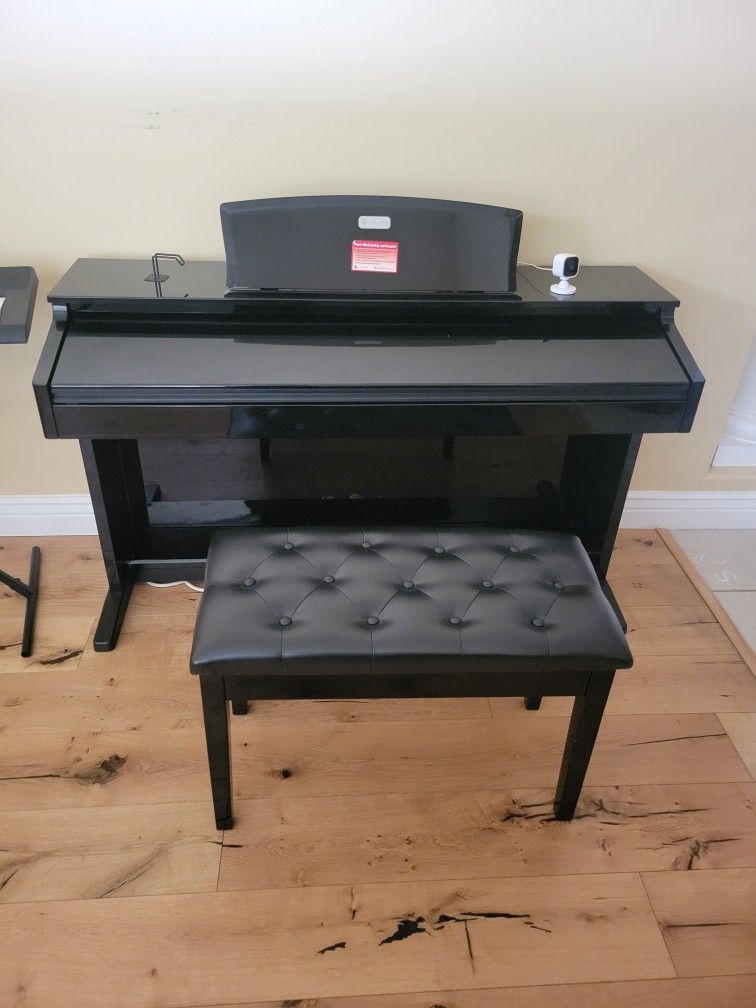 Piano with bench