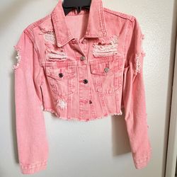 Pink distressed denim jacket