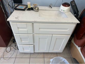 White vanity with countertop and drawer