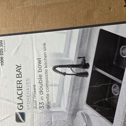 Glacier Bay
Stonehaven 33 in. Drop-In 50/50 Double Bowl Black Onyx Granite Composite Kitchen Sink with Stainless Steel Strainer