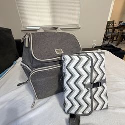 Diaper bag with changing pad