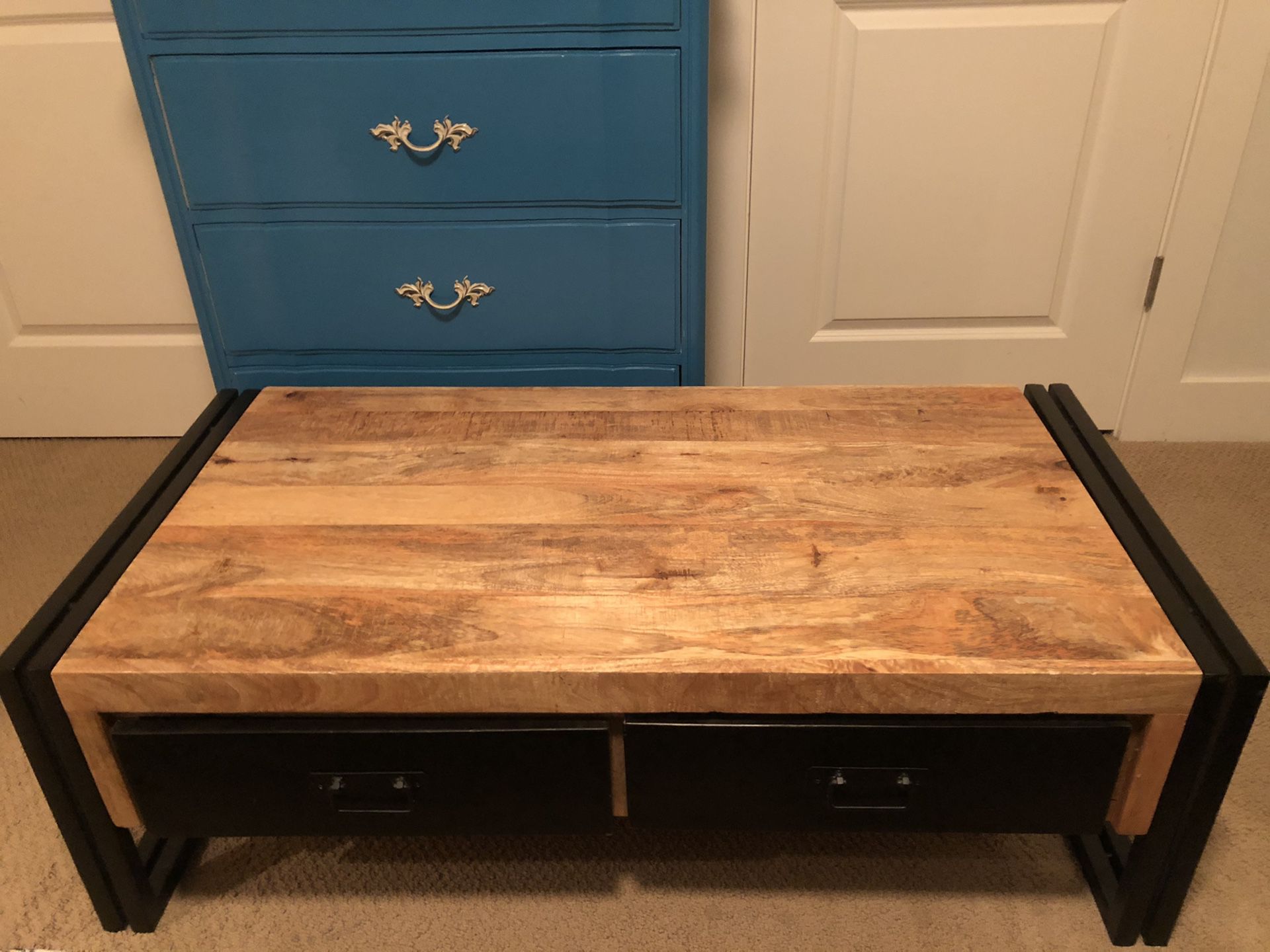 Rustic reclaimed wood coffee table.