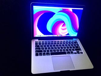 MacBook Pro 13” Retina with editing and music production software