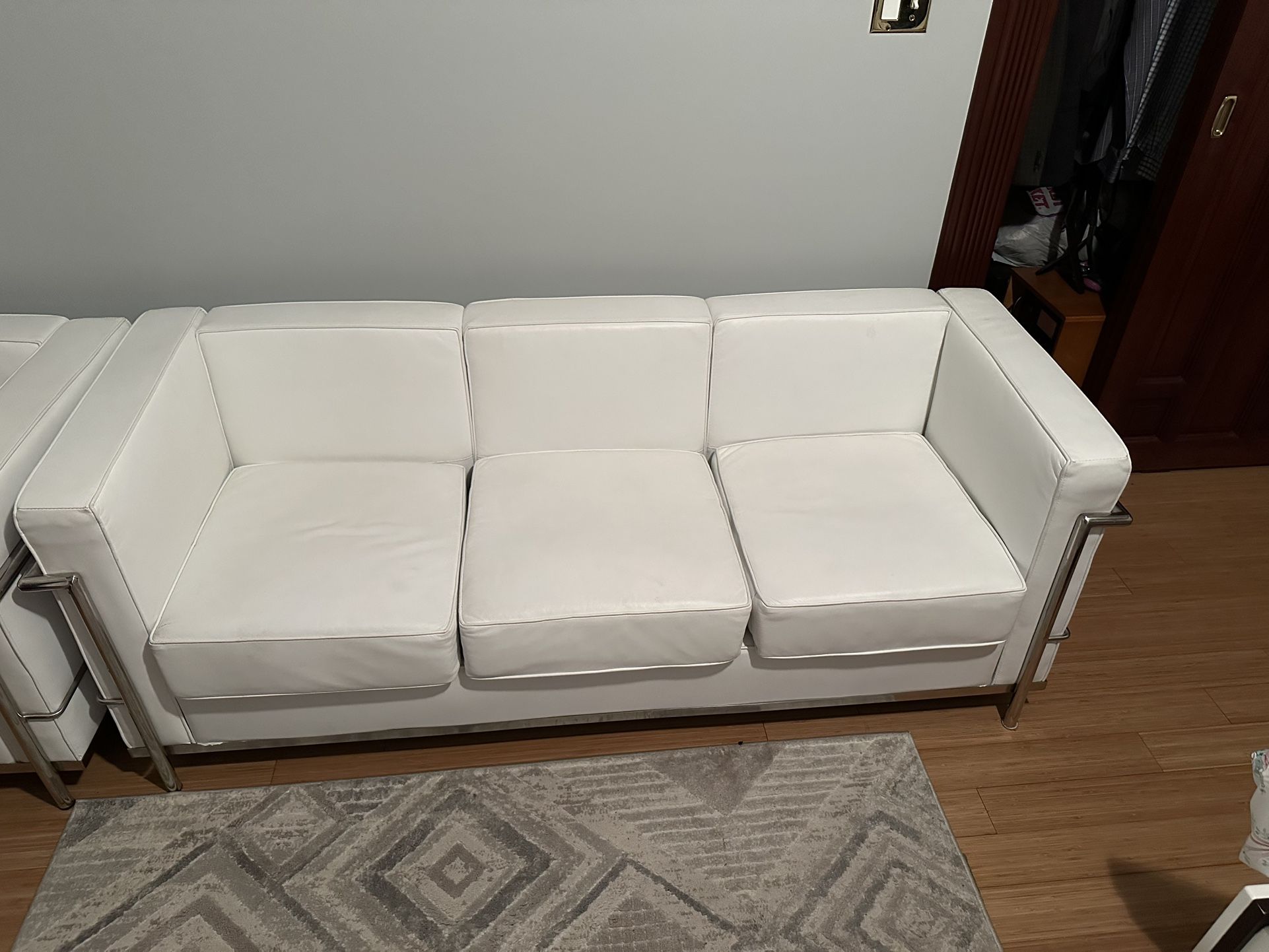 White Leather Sofa And Armchair