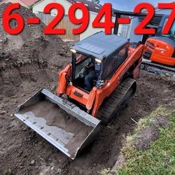 Bobcat And Excavator