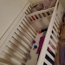 Small crib with changing table and drawers Changes Into A Toddler Bed  OBO