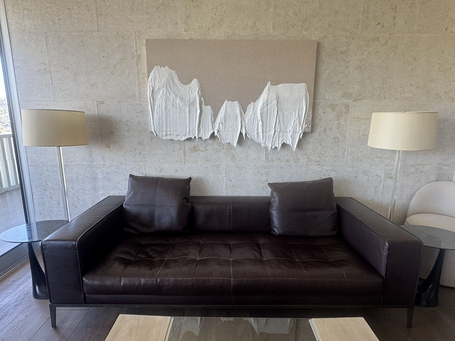 Maxalto Simplice Sofa With Dark Leather And A Bronze Base