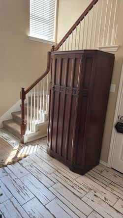 Armoire - great coat closet or storage.