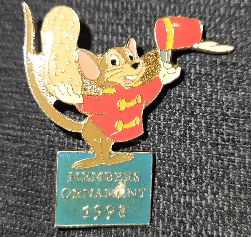 Disney pin featuring Timothy Q. Mouse from the movie Dumbo