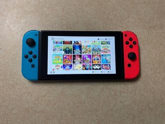 NINTENDO SWITCH + 120 SWITCH GAMES
