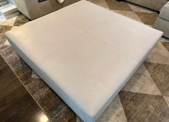 Large leather ottoman, center piece