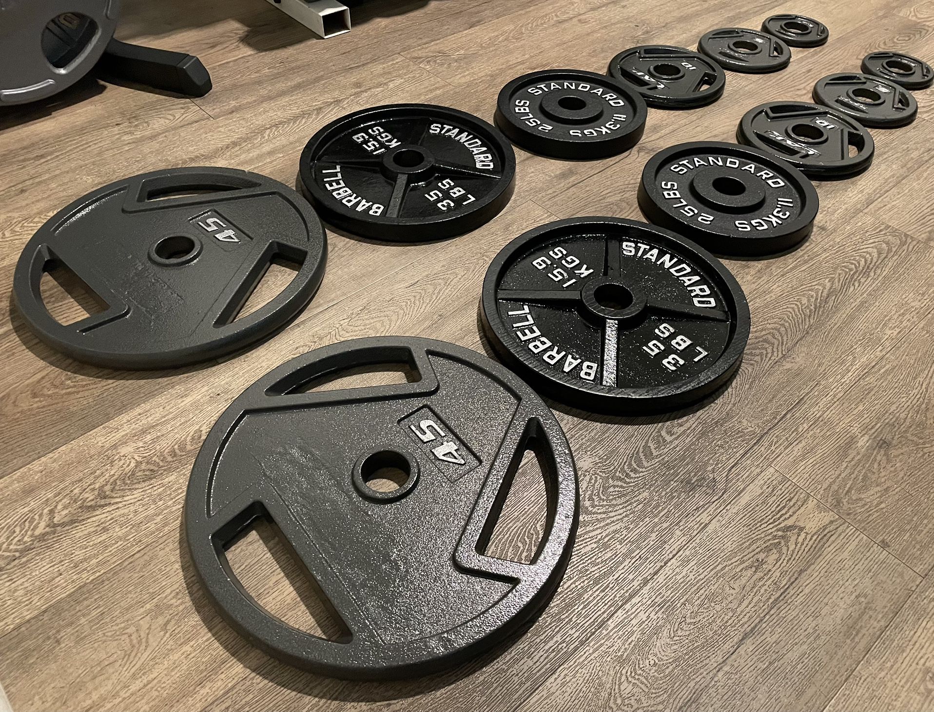 Brand NEW Full Set Of Olympic Weight Plates [Cast iron = 245 lbs]