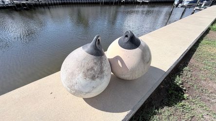 Two big Taylor made boat ball fenders