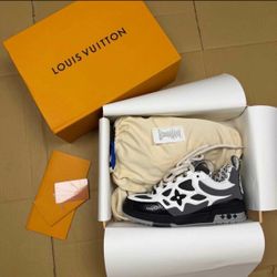 Grey black and white lv skates