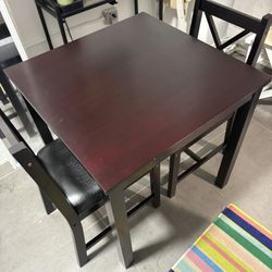 Table and two chairs