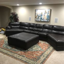 Full brown leather couch with ottoman