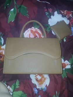 Brown hand purse with strap