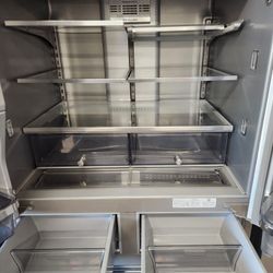 Un Refrijerador Sinco Puertas KitcnenAid Cuatro Meses De Garantia Se Yeva Adomisilio
