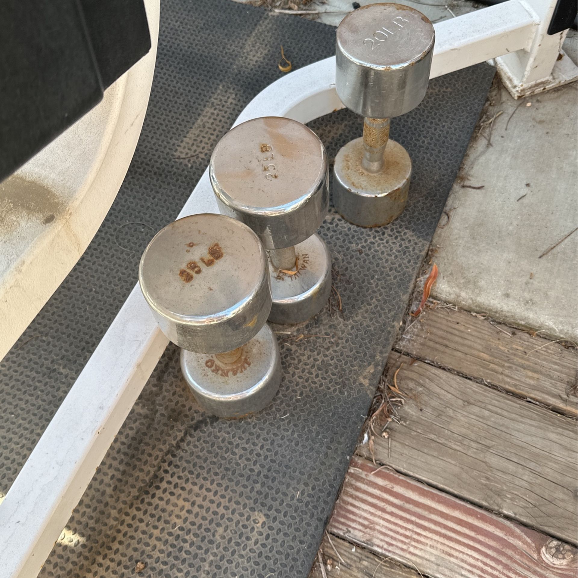 Two Ivanko Dumbbells And One Hampton Dumbbell