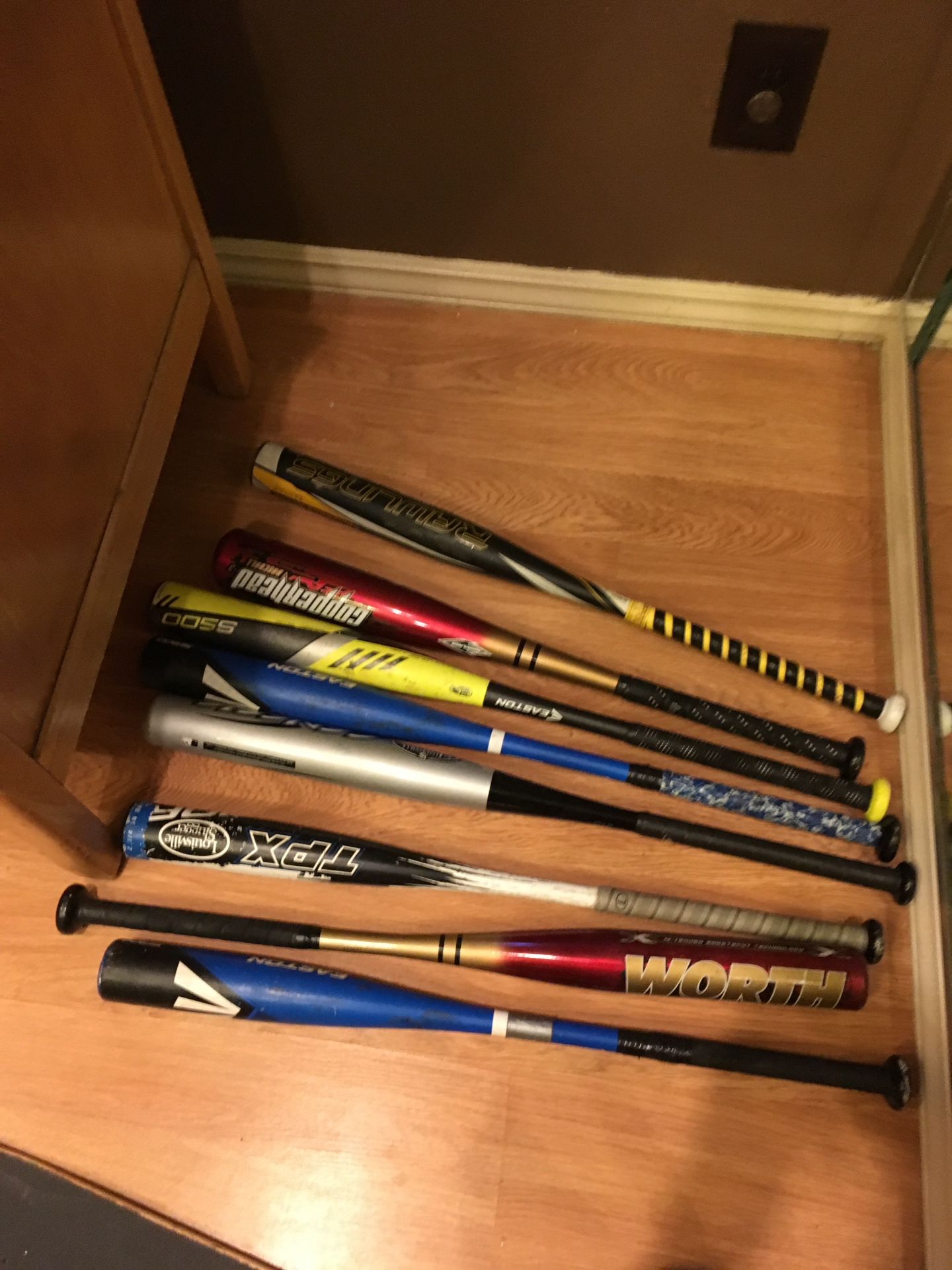 Many different lightly used baseball bats