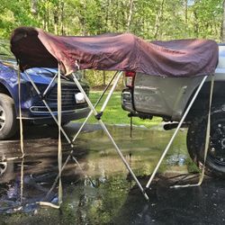 Sunbrella 6ft Maroon Boat Bimini with Zippered Cover Case in good condition. Has one small hole in the canopy. Pickup in Burrsville, MD just outside o