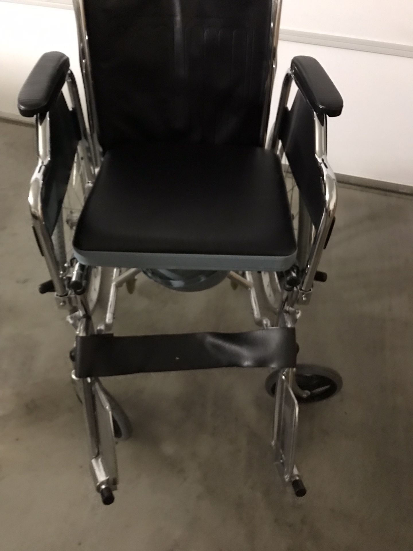 Wheelchair/elderly stroller with plastic bucket toilet. Foldable.