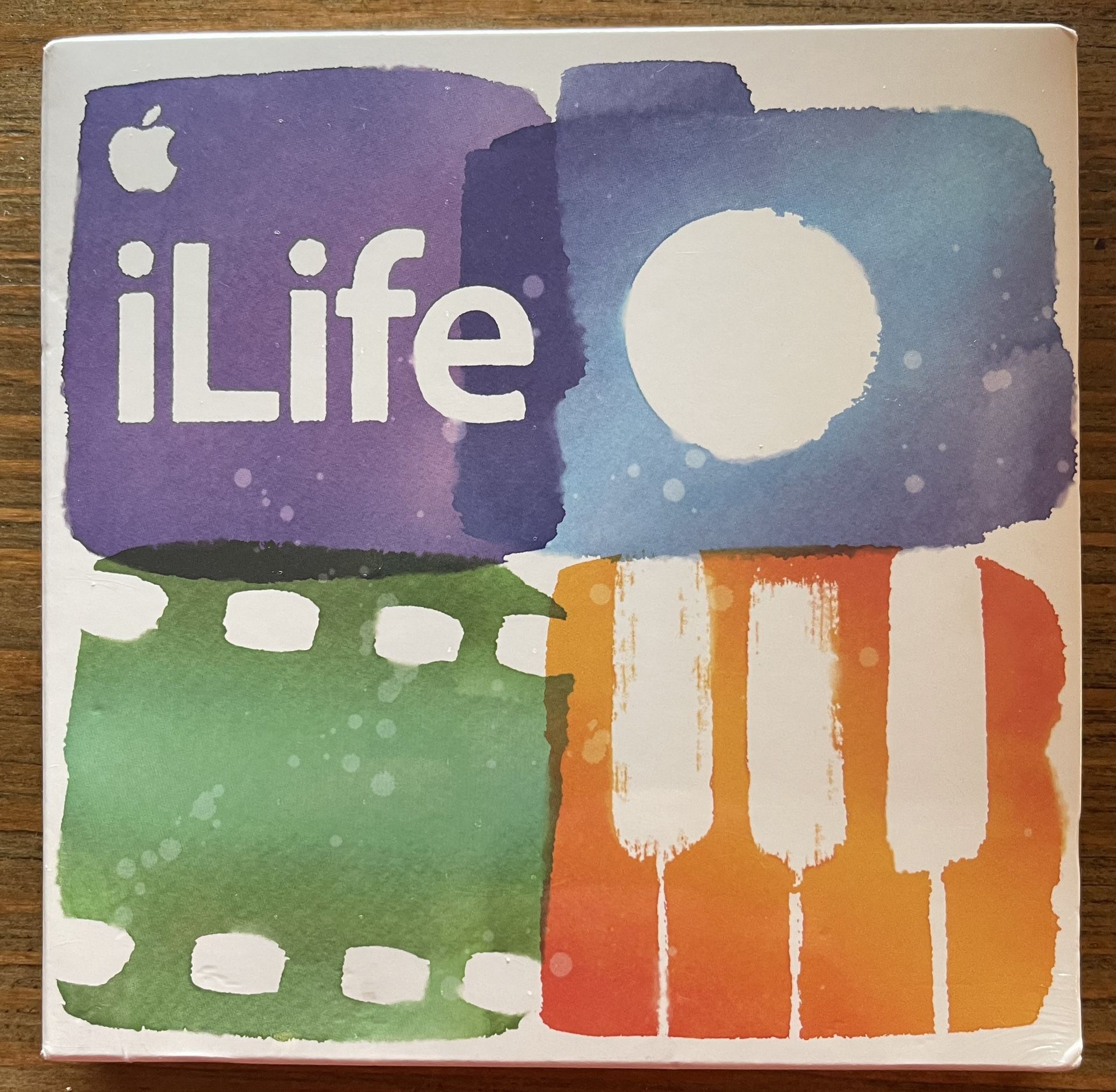 iLife 11 (iPhoto, iMovie, Garage Band). Never-opened Box